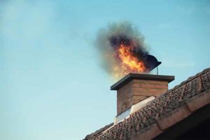 Chimney service Lacey helps prevent chimney fires like one pictured
