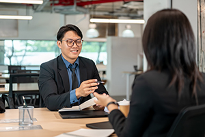 Branch manager and employee of NJ ITM companies having an important conversation